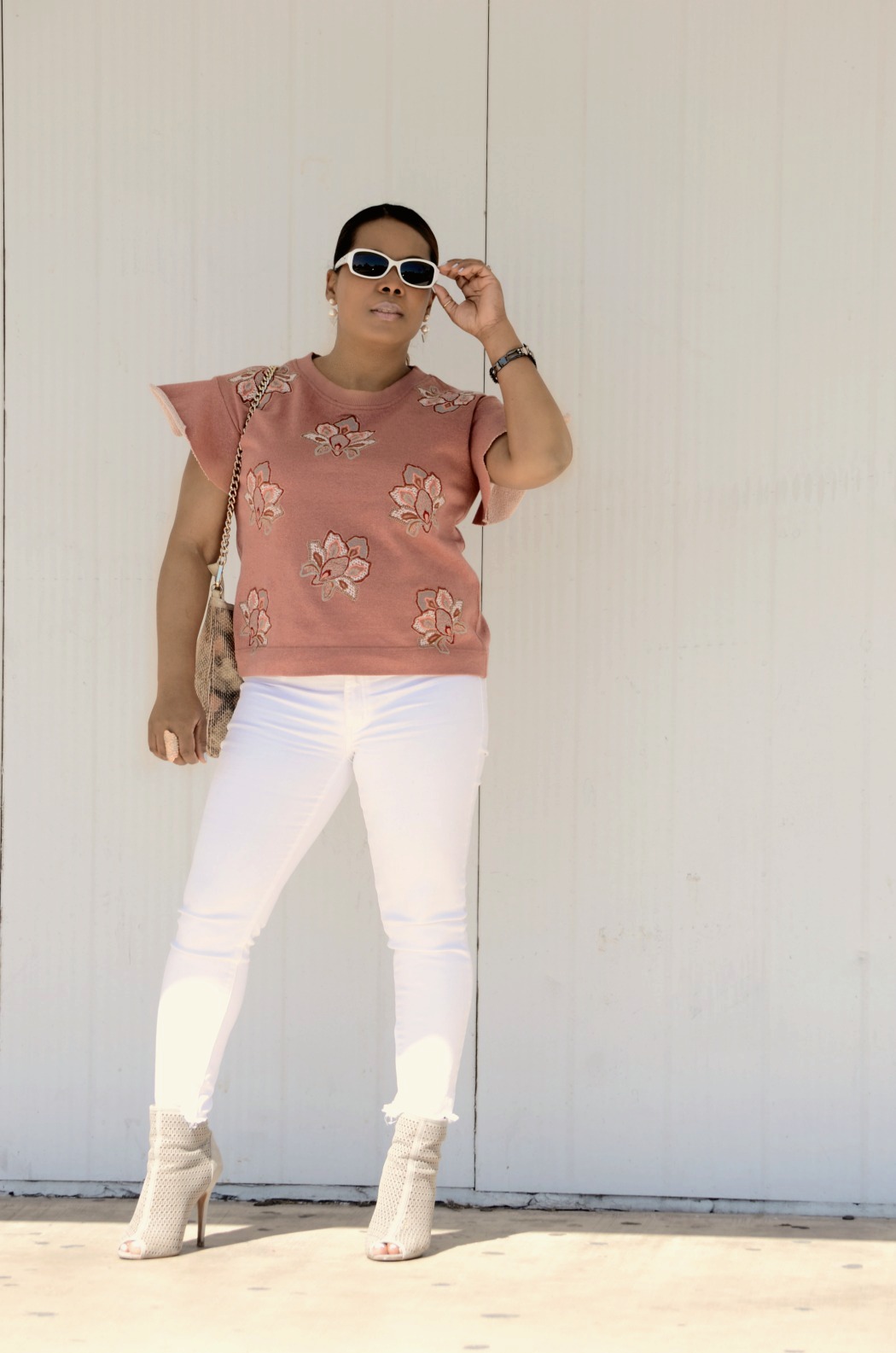 American Eagle High rise frayed skinny white jeans_Anthropologie flutter sleeve embroidered pink top_Chinese Laundry Perforated Ankkle Booties_Aldo Snakeskin Foldover Clutch