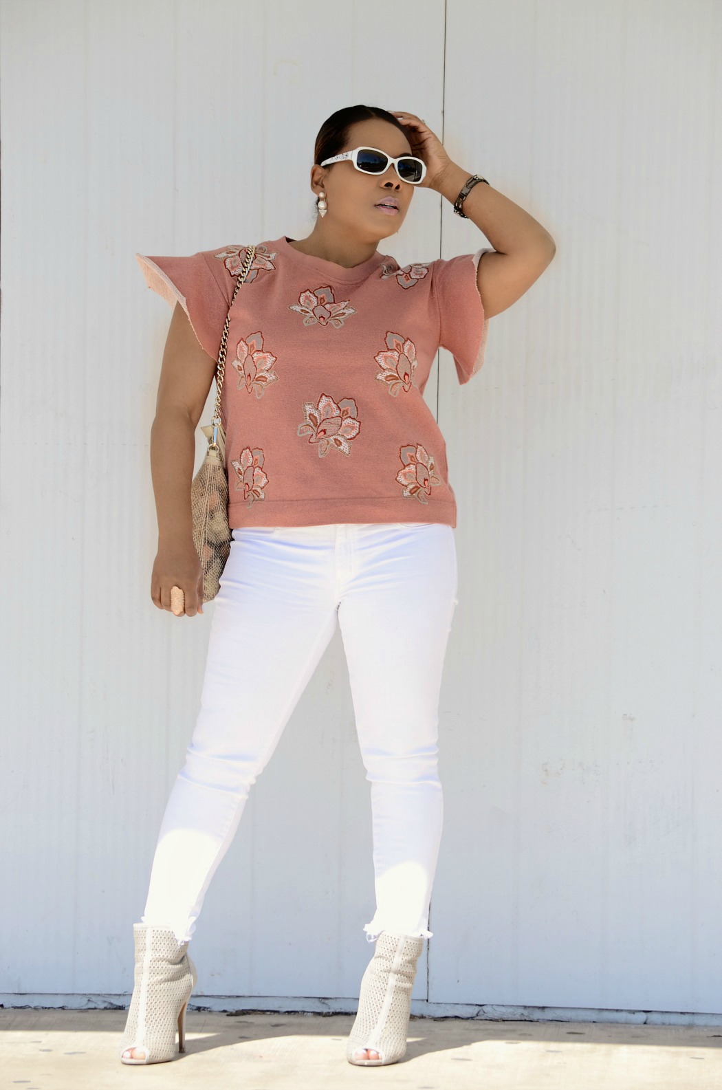 American Eagle High rise frayed skinny white jeans_Anthropologie flutter sleeve embroidered pink top_Chinese Laundry Perforated Ankkle Booties_Aldo Snakeskin Foldover Clutch