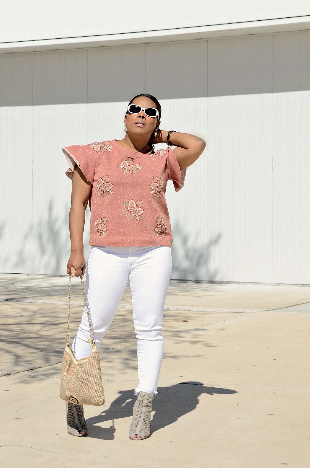 American Eagle High rise frayed skinny white jeans_Anthropologie flutter sleeve embroidered pink top_Chinese Laundry Perforated Ankkle Booties_Aldo Snakeskin Foldover Clutch